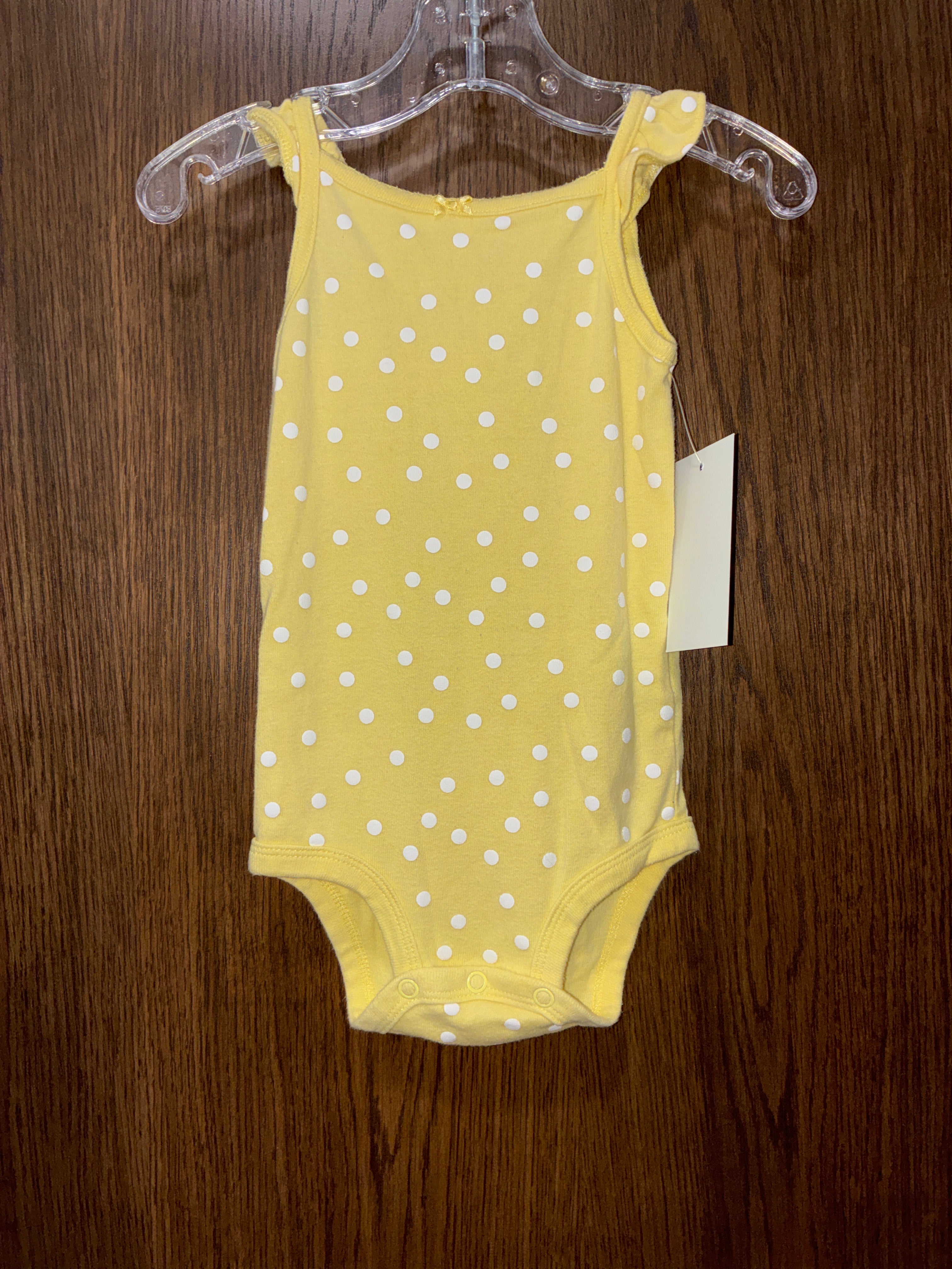 Girls yellow polka dot onesie size 18M